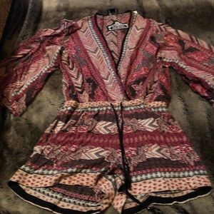 Multi color romper New with tags